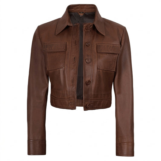 Women's cropped brown leather trucker jacket front view showing button-down closure and chest flap pockets.
