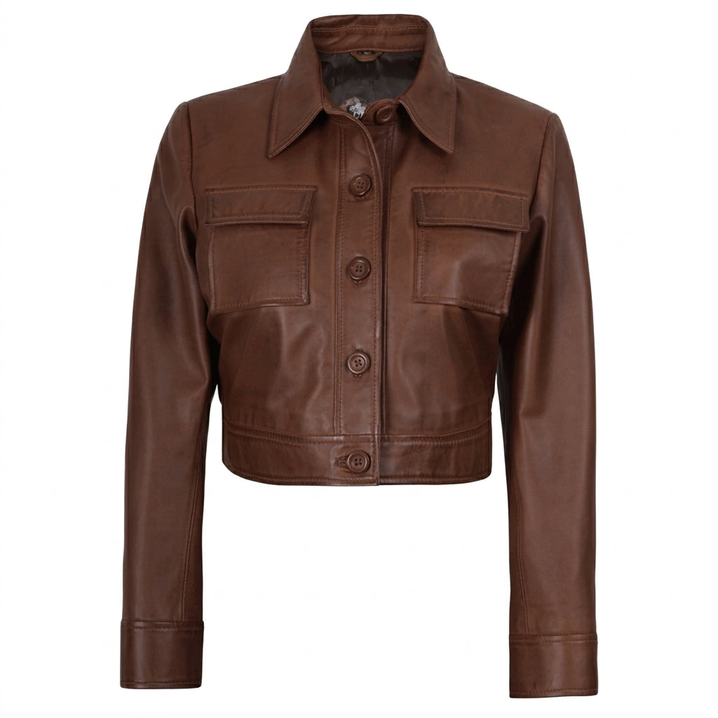 Women's cropped brown leather trucker jacket front view showing button-down closure and chest flap pockets.