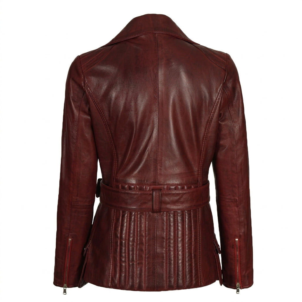 Women's maroon asymmetrical belted leather biker jacket front view showing metal buckle and zippers.