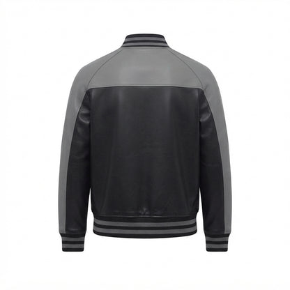 Men's Black and Grey Leather Varsity Jacket front view with contrast shoulders, snap-button placket, and striped ribbing, white background