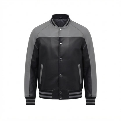 Men's Black and Grey Leather Varsity Jacket front view with contrast shoulders, snap-button placket, and striped ribbing, white background