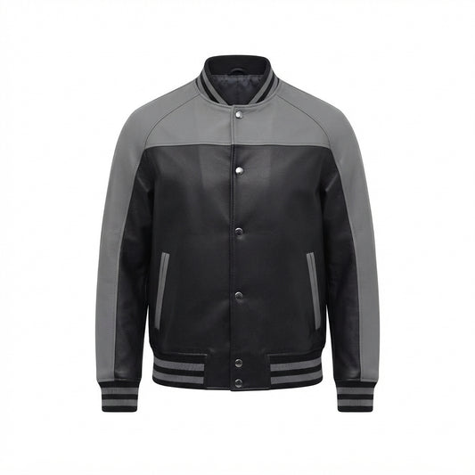 Men's Black and Grey Leather Varsity Jacket front view with contrast shoulders, snap-button placket, and striped ribbing, white background