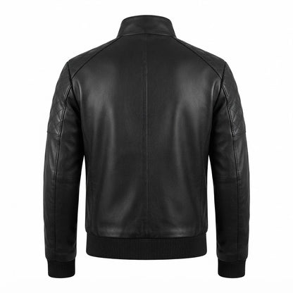 Men’s Black Leather Bomber Jacket front view featuring genuine black leather, stand collar, chest zip pockets, full metal zip, and ribbed hem   