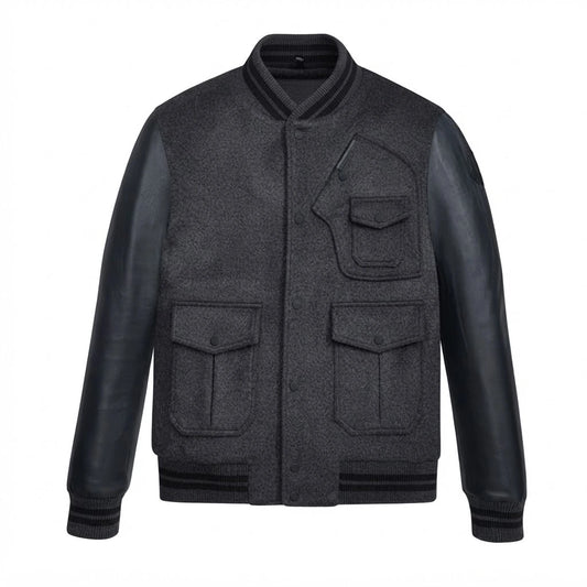 Men’s Black Wool & Leather Varsity Bomber Jacket front view featuring charcoal wool body, genuine leather sleeves, chest utility pockets, and striped ribbed trim   